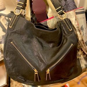 Micheal kors black handbag gold